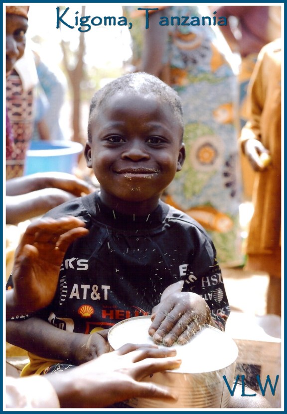 Tanzania Kigoma refugee boy with creative drum (2)